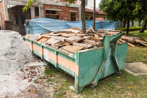 Professional home clearance team in Poplar working on a property