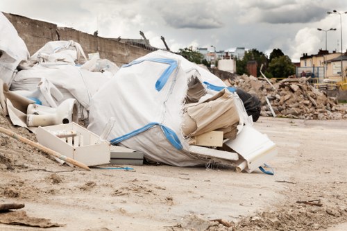 Clearance workers responsibly recycling items in Poplar